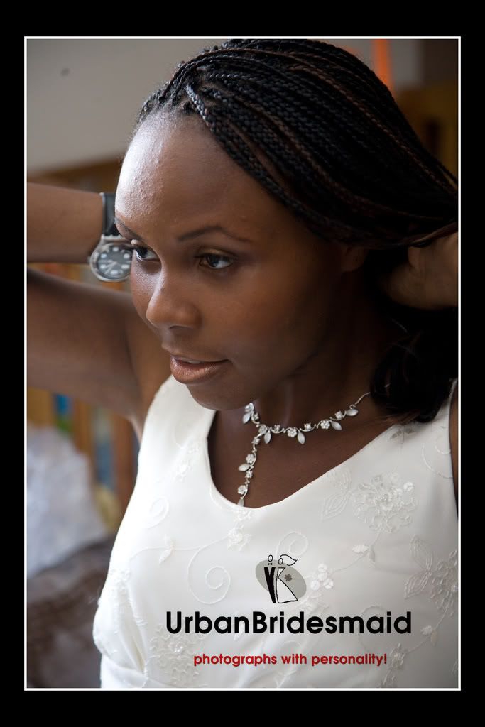 Bride putting jewellery