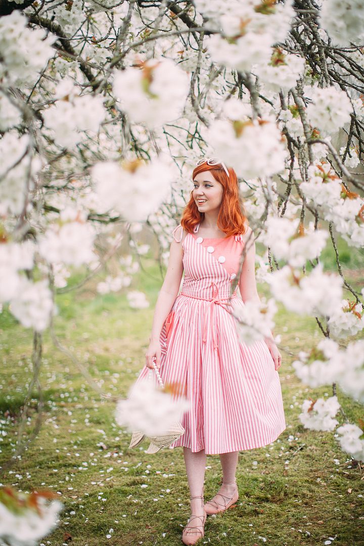 red hair pink outfit