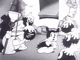 Creepy  characters with candles on their heads are chanting WANNA BE A MEMBER at Bimbo in Bimbos initiation cartoon from Fleisher Brothers Studios